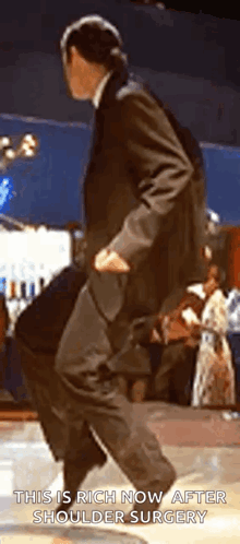 Man in Suit Dancing This Is Rich Now After Shoulder Surgery