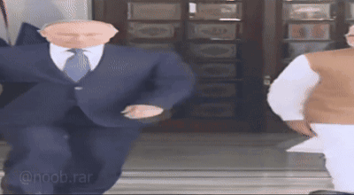 Man In Suit Dancing With Another Man GIF