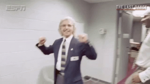Man In Suit Dancing With Last Dance Behind Him GIF