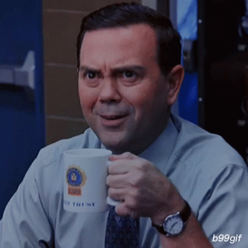 Man in Suit Drinking Coffee Mug Saying Police Trust