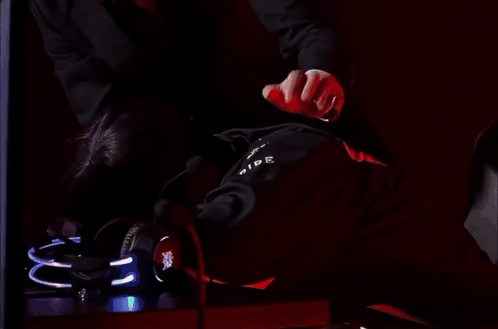 Man in Suit Drinking Vodka Bottle