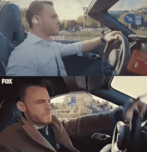 Man in Suit Driving Car Saying Fox