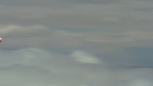 Man in Suit Flying with Chest Rocket
