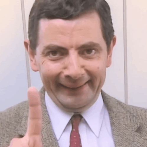 Man In Suit Giving Thumbs Up GIF