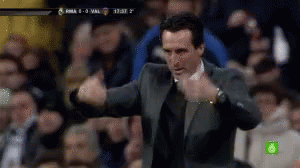 Man In Suit Giving Thumbs Up In Front Of Crowd GIF