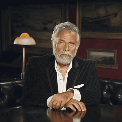 Man in Suit Hand to Face