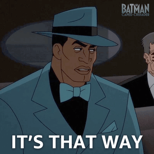 Man in Suit Hat Saying It's That Way