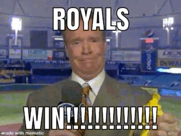 Man in Suit Holding Banana Saying Royals Win