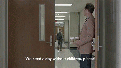 Man In Suit Holding Book GIF