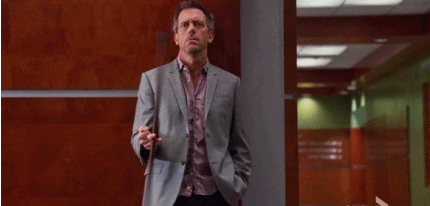 Man in Suit Holding Cane