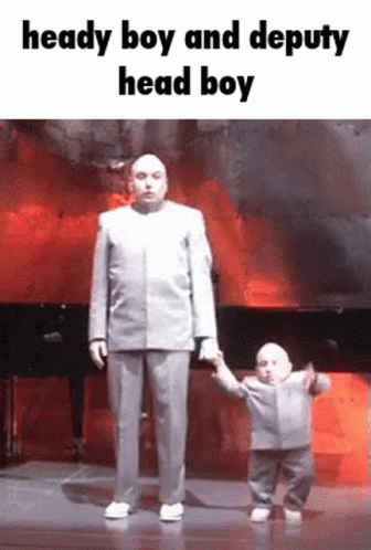 Man in Suit Holding Child's Hand