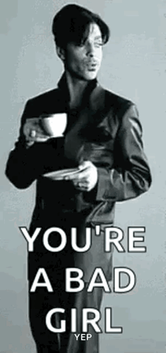 Man in Suit Holding Coffee and Plate