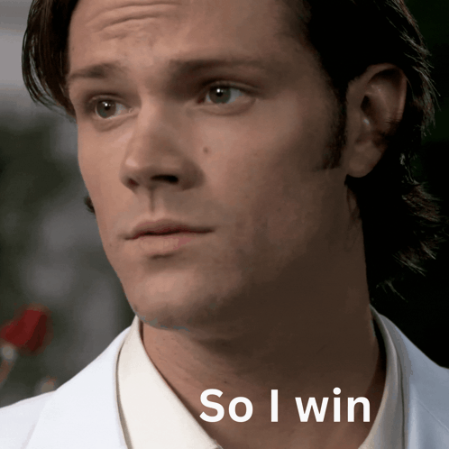 Man In Suit Holding Did I Win Paper GIF
