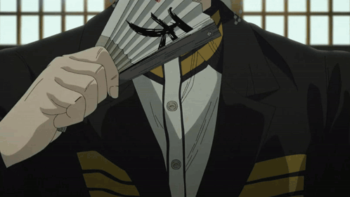 Man in Suit Holding Fan