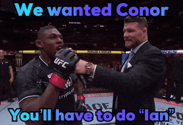 Man In Suit Holding Fighter Hand Says We Wanted Conor You'll Have To Do Lan GIF