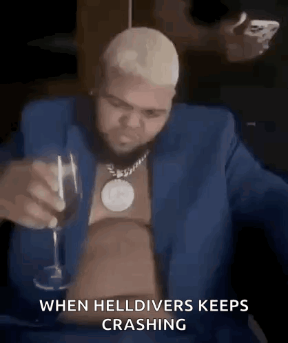 Man in Suit Holding Glass of Wine