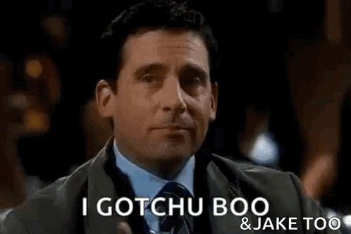 Man in Suit Holding Glass Saying I Gotchu Boo and Jake Too