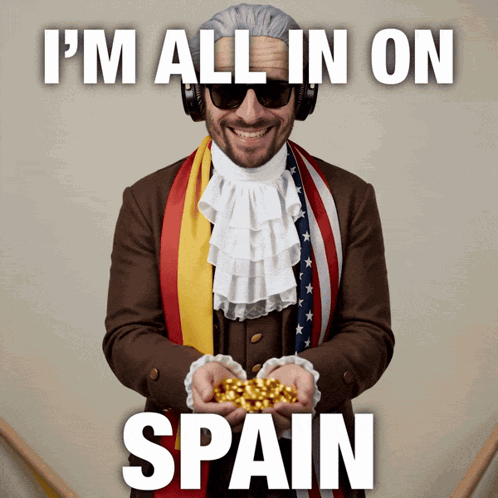 Man in Suit Holding Gold I'm All In on Spain