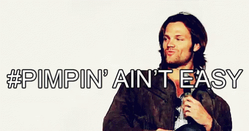 Man In Suit Holding Gun Saying Pimpin Ain't Easy GIF