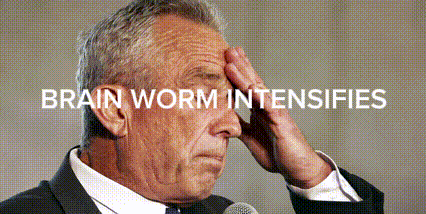 Man in Suit Holding Head to Microphone Brain Worm Intensifies