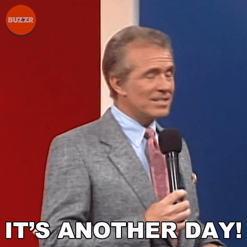 Man In Suit Holding Microphone Saying It's Another Day GIF