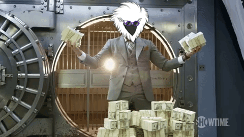 Man In Suit Holding Money At Showtime Vault GIF