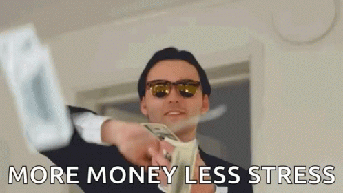 Man in Suit Holding Money More Money Less Stress