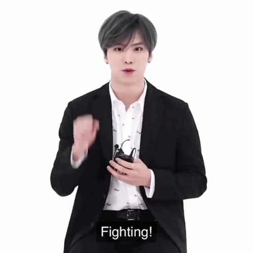 Man In Suit Holding Remote Fighting GIF