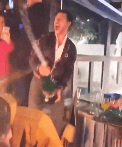 Man In Suit Holding Trophy Singing Thank You Guys So Much GIF