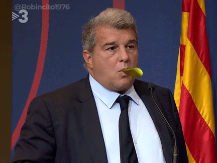 Man In Suit Holding Yellow Object In Mouth With Flag Number 3 GIF