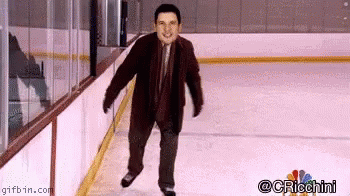 Man in Suit Ice Skating