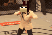 Man In Suit In Boxing Ring Saying Manguin GIF