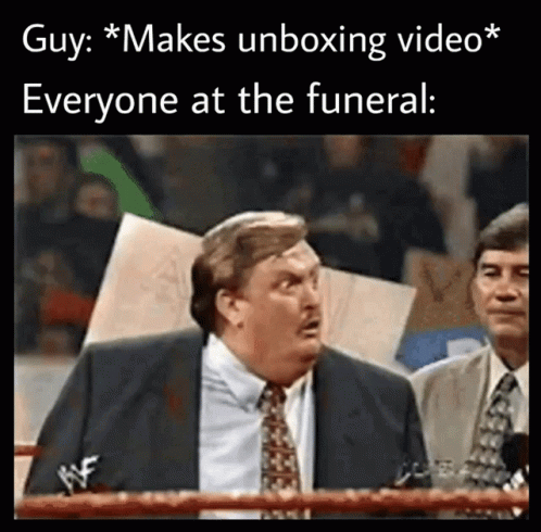 Man in Suit in Boxing Ring Says Guy Makes Unboxing Video Everyone at the Funeral