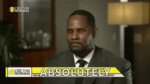 Man In Suit In Front Of CBS This Morning Sign GIF