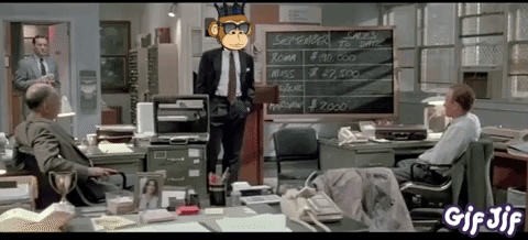 Man in Suit in Front of Chalkboard September Sales to Date