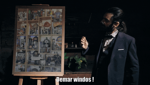 Man in Suit in Front of Demar Windos Display Board