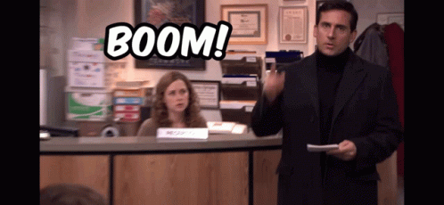 Man in Suit in Front of Woman Behind Counter With Boom