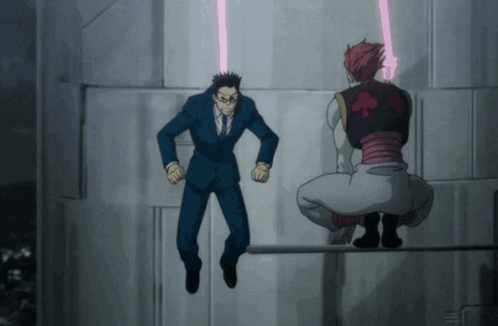 Man In Suit Jumping Over Squatting Man GIF