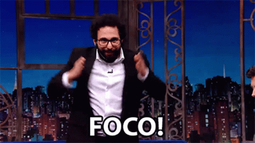 Man in Suit Jumping With Foco