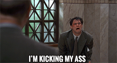Man in Suit Kicking His Ass