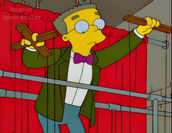 Man In Suit Kneeling GIF