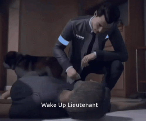 Man in Suit Kneeling Over Man Wake Up Lieutenant