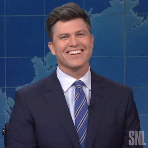 Man In Suit Laughing And Clapping GIF