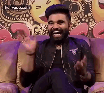 Man In Suit Laughing Saying Good Joke GIF