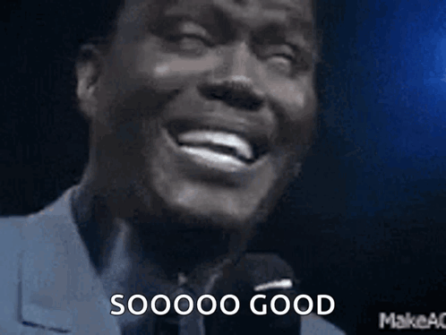 Man in Suit Laughing Saying Sooo Good