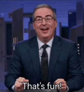 Man in Suit Laughing Saying That's Fun