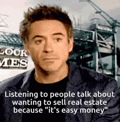 Man in Suit Listening to It's Easy Money