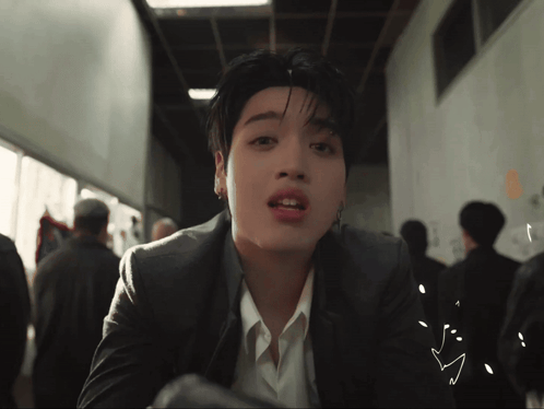 Man in Suit Looking at Camera Heart Drawing