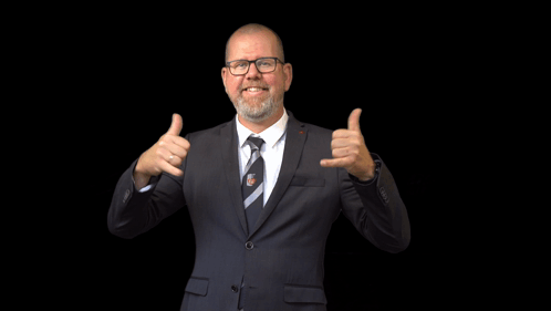 Man in Suit Looking Down With Brand Manager