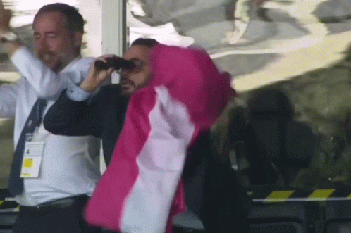 Man In Suit Looking Through Binoculars Woman In Pink Jacket GIF